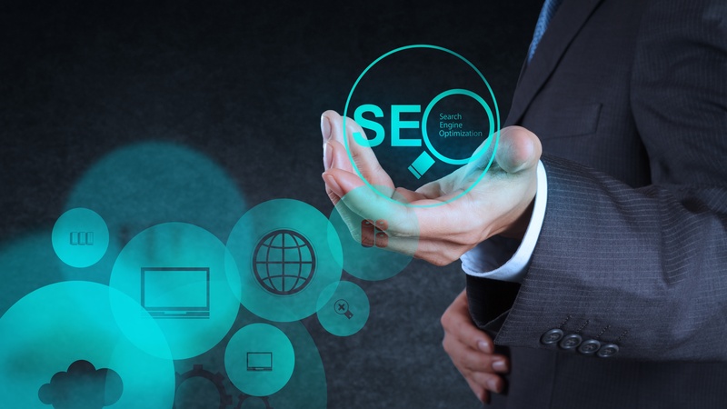 19646784 – businessman hand showing search engine optimization seo as concept